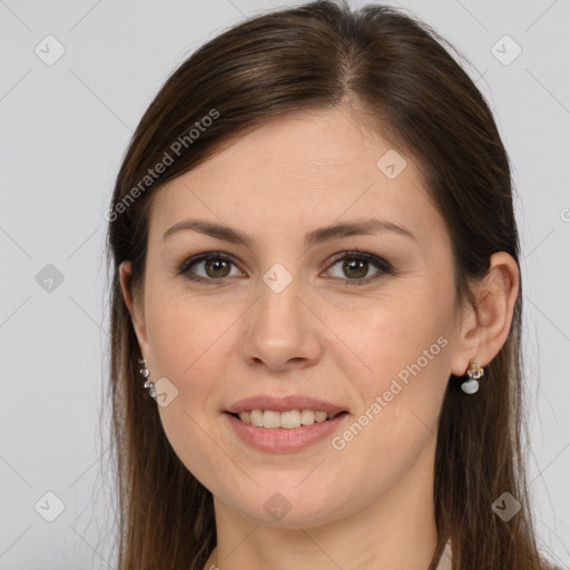 Joyful white young-adult female with long  brown hair and grey eyes