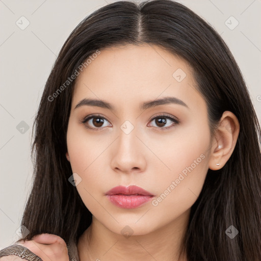 Neutral white young-adult female with long  brown hair and brown eyes