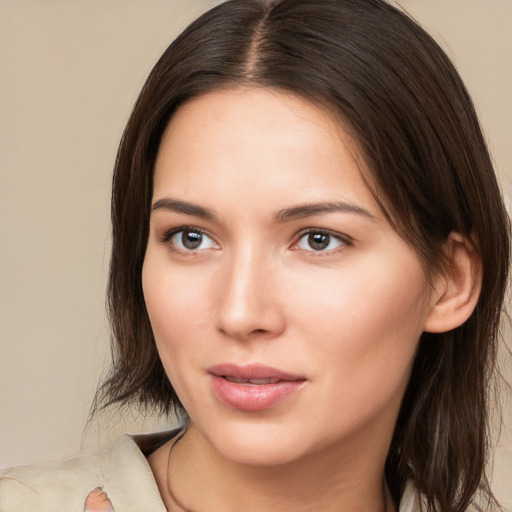 Neutral white young-adult female with medium  brown hair and brown eyes