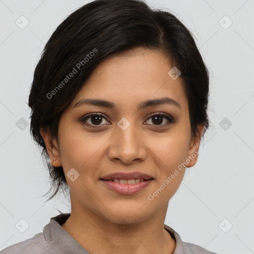 Joyful latino young-adult female with medium  brown hair and brown eyes