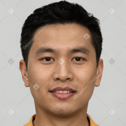 Joyful asian young-adult male with short  black hair and brown eyes