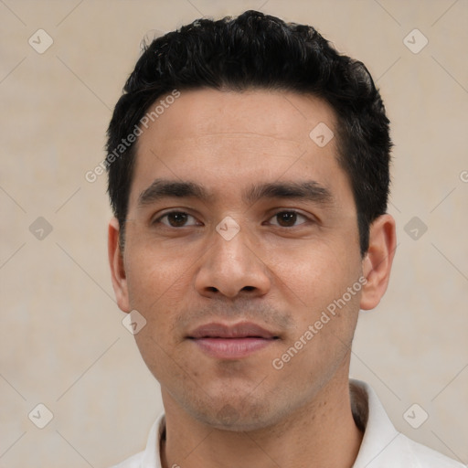 Joyful asian young-adult male with short  black hair and brown eyes