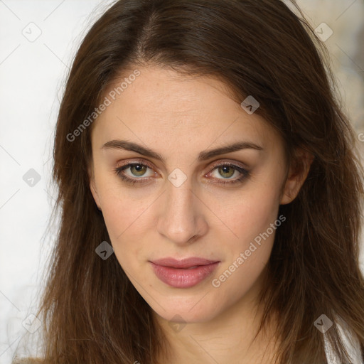 Joyful white young-adult female with long  brown hair and green eyes