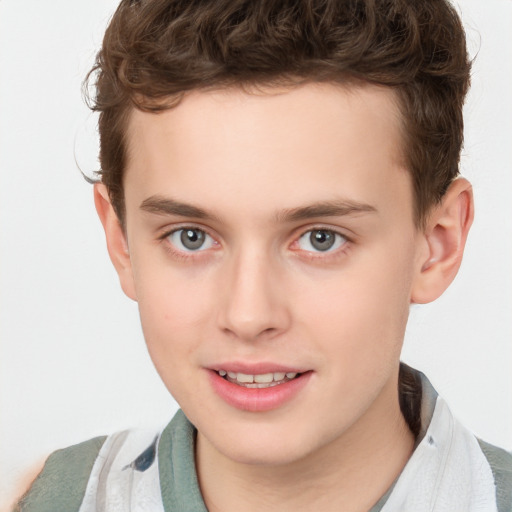 Joyful white young-adult male with short  brown hair and blue eyes