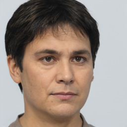 Neutral white adult male with short  brown hair and brown eyes