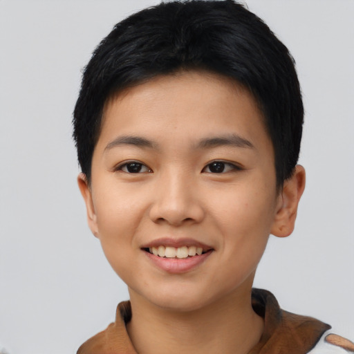 Joyful asian young-adult female with short  black hair and brown eyes