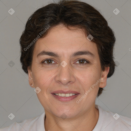 Joyful white adult female with short  brown hair and brown eyes