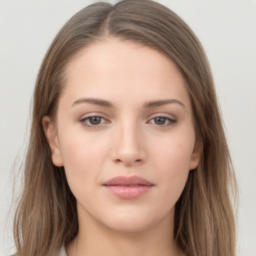 Neutral white young-adult female with long  brown hair and grey eyes