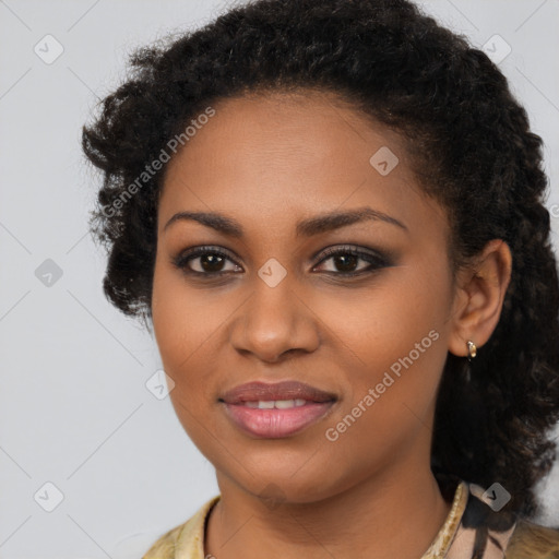 Joyful black young-adult female with medium  black hair and brown eyes