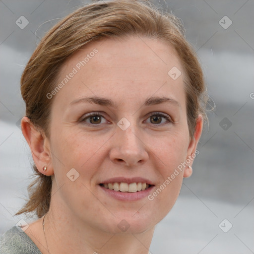 Joyful white adult female with short  brown hair and grey eyes