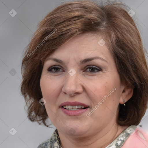 Joyful white adult female with medium  brown hair and grey eyes