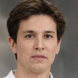 Neutral white adult male with short  brown hair and brown eyes