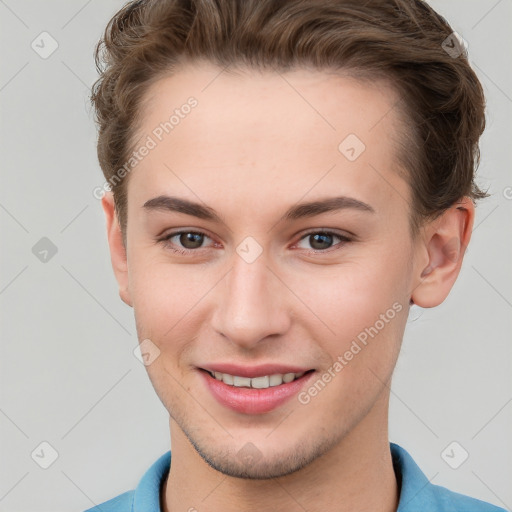 Joyful white young-adult female with short  brown hair and grey eyes