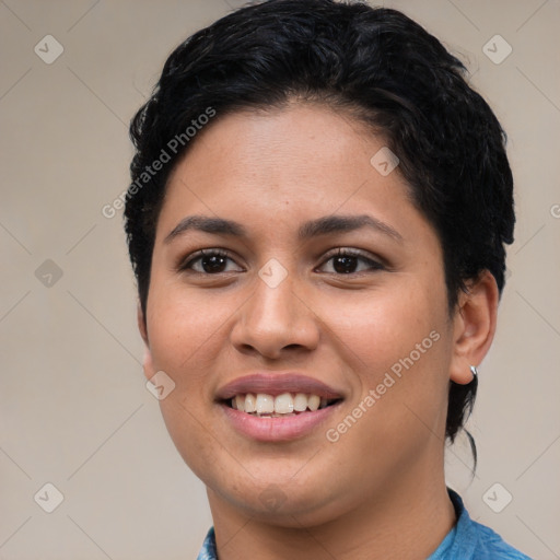 Joyful latino young-adult female with short  brown hair and brown eyes