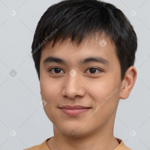 Joyful asian young-adult male with short  brown hair and brown eyes