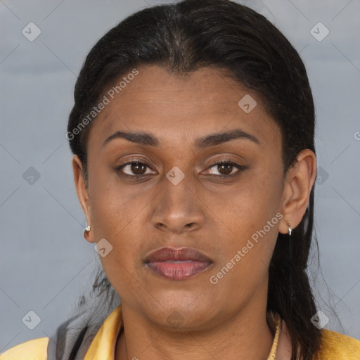 Joyful latino young-adult female with short  brown hair and brown eyes