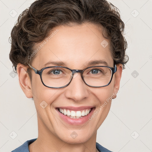 Joyful white adult female with short  brown hair and grey eyes