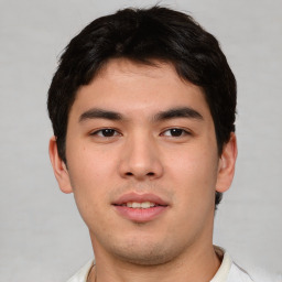 Neutral asian young-adult male with short  brown hair and brown eyes