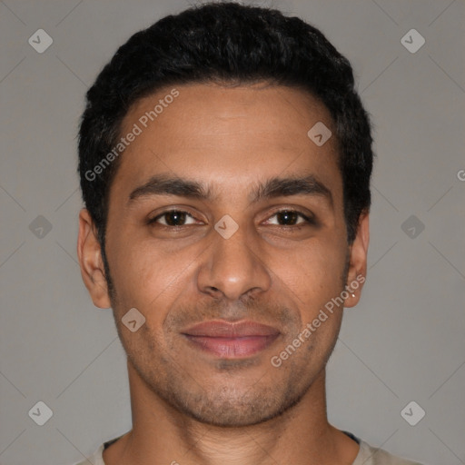 Joyful latino young-adult male with short  black hair and brown eyes