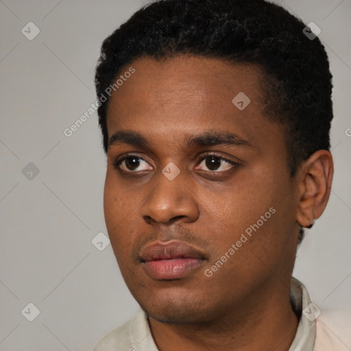 Neutral black young-adult male with short  black hair and brown eyes