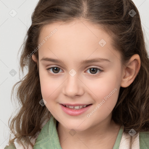 Joyful white child female with medium  brown hair and brown eyes