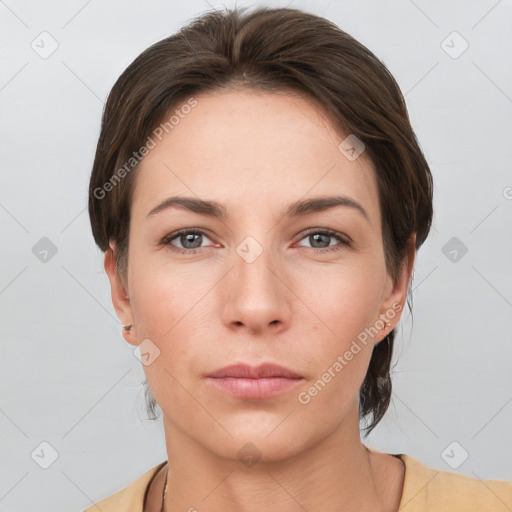 Neutral white young-adult female with short  brown hair and brown eyes