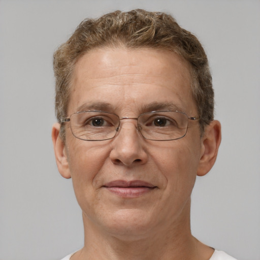 Joyful white middle-aged male with short  brown hair and brown eyes