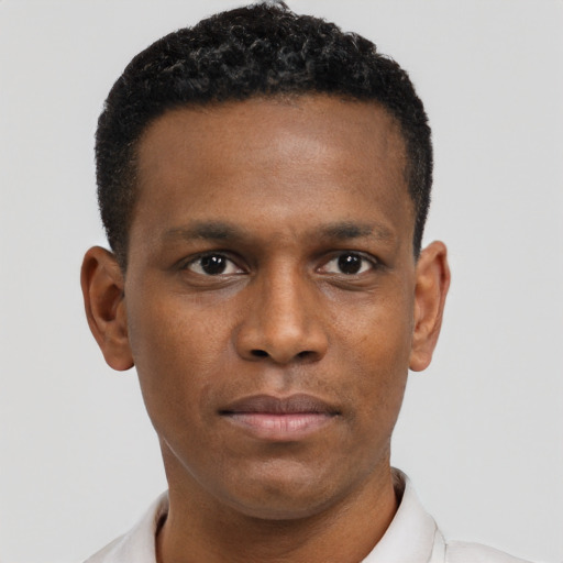 Neutral black young-adult male with short  black hair and brown eyes