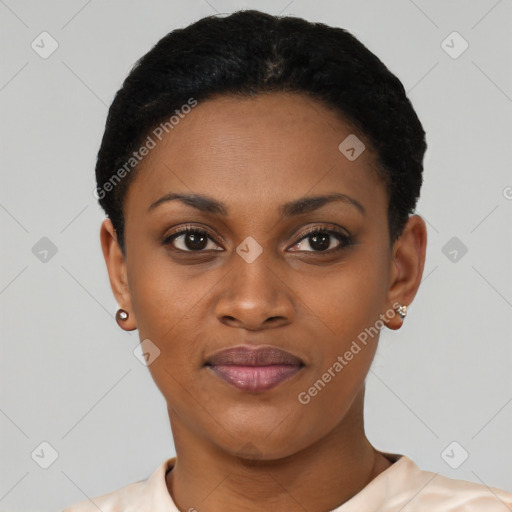 Joyful black young-adult female with short  black hair and brown eyes