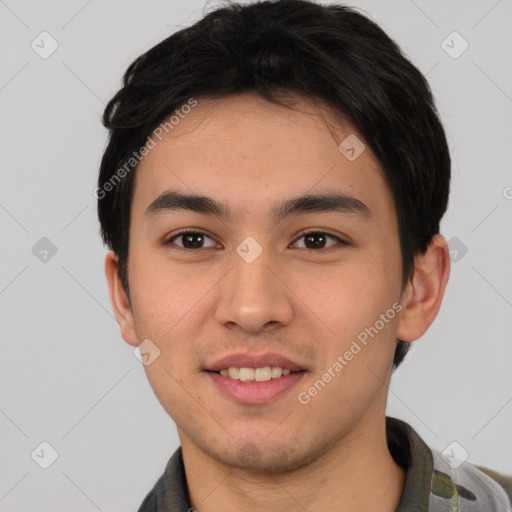 Joyful asian young-adult male with short  black hair and brown eyes