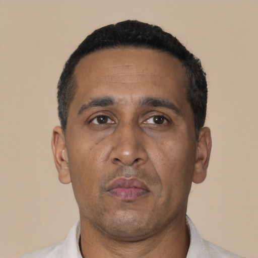 Neutral black adult male with short  black hair and brown eyes