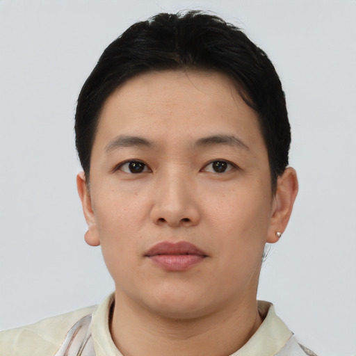 Neutral asian young-adult male with short  brown hair and brown eyes