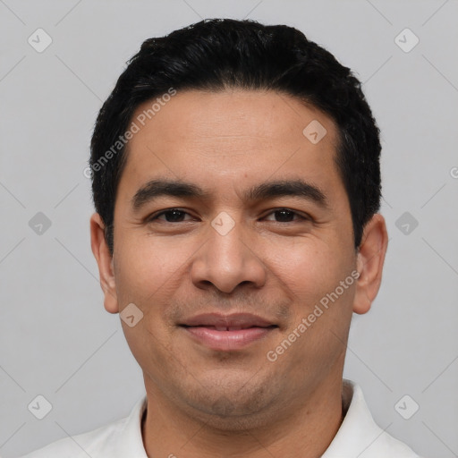 Joyful asian young-adult male with short  black hair and brown eyes