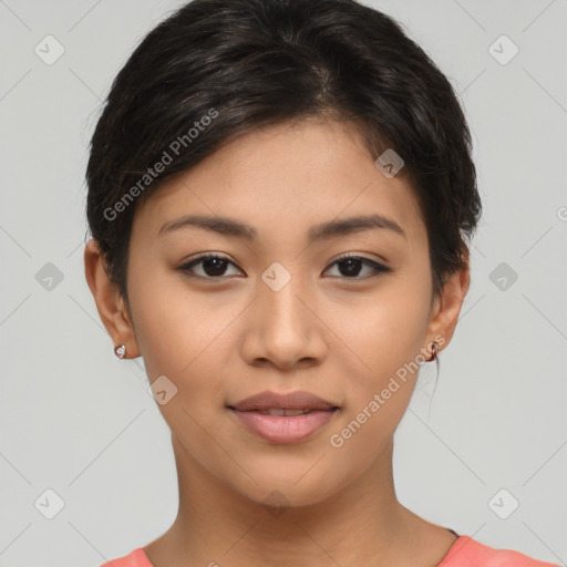 Joyful latino young-adult female with short  brown hair and brown eyes