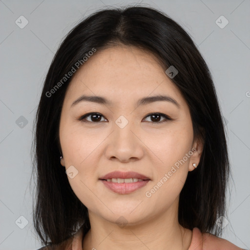 Joyful asian young-adult female with medium  brown hair and brown eyes