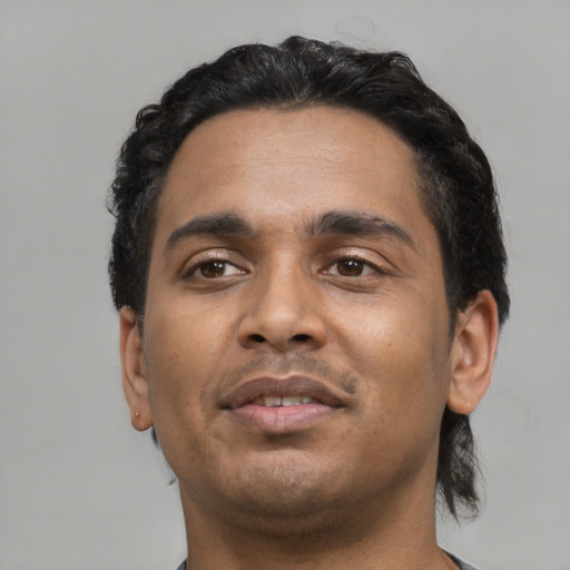 Neutral black adult male with short  black hair and brown eyes