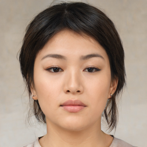 Neutral asian young-adult female with medium  brown hair and brown eyes