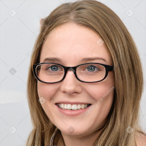 Joyful white young-adult female with long  brown hair and blue eyes