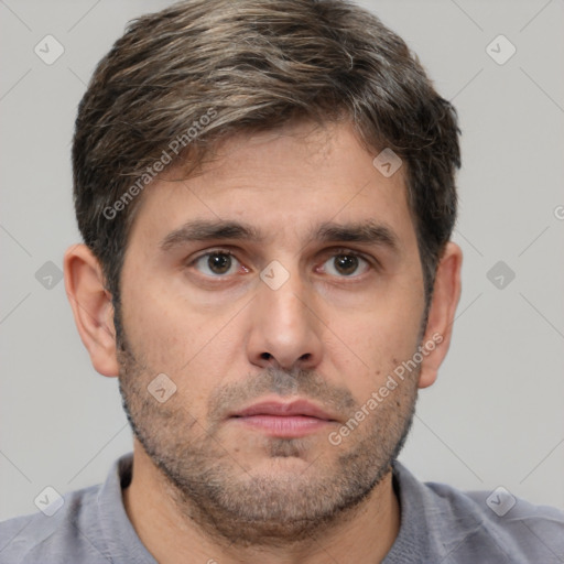 Neutral white adult male with short  brown hair and brown eyes