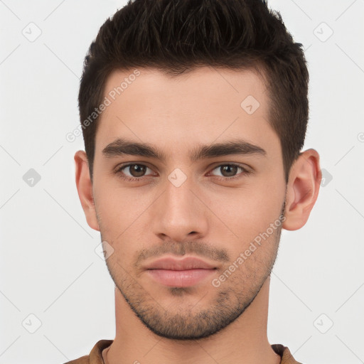 Neutral white young-adult male with short  brown hair and brown eyes