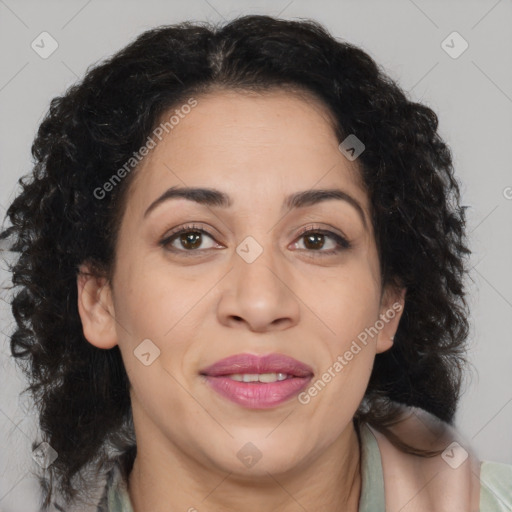 Joyful black adult female with medium  brown hair and brown eyes