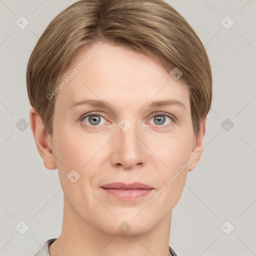 Joyful white young-adult female with short  brown hair and grey eyes