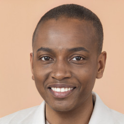 Joyful black young-adult male with short  brown hair and brown eyes