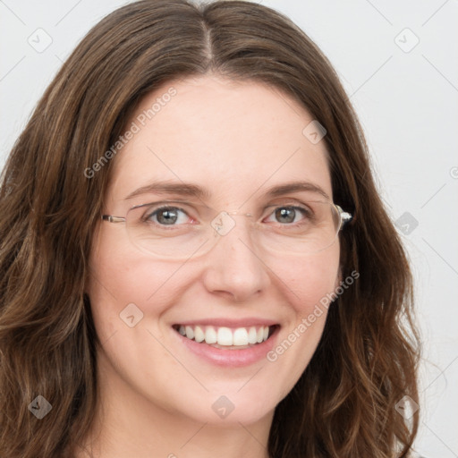 Joyful white young-adult female with long  brown hair and green eyes