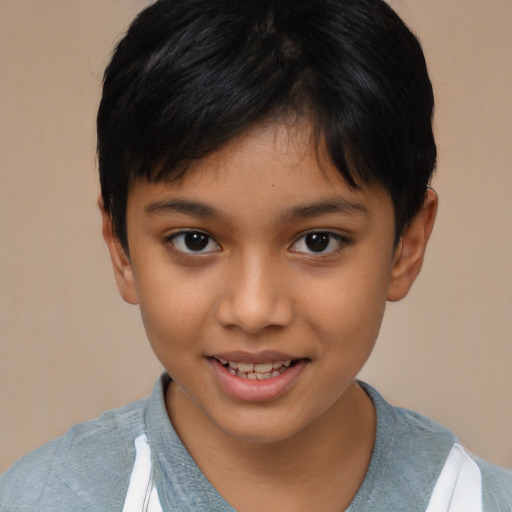 Joyful asian child female with short  brown hair and brown eyes