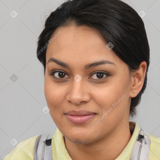 Joyful latino young-adult female with medium  brown hair and brown eyes