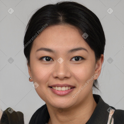 Joyful asian young-adult female with short  brown hair and brown eyes