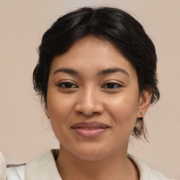 Joyful asian young-adult female with medium  brown hair and brown eyes