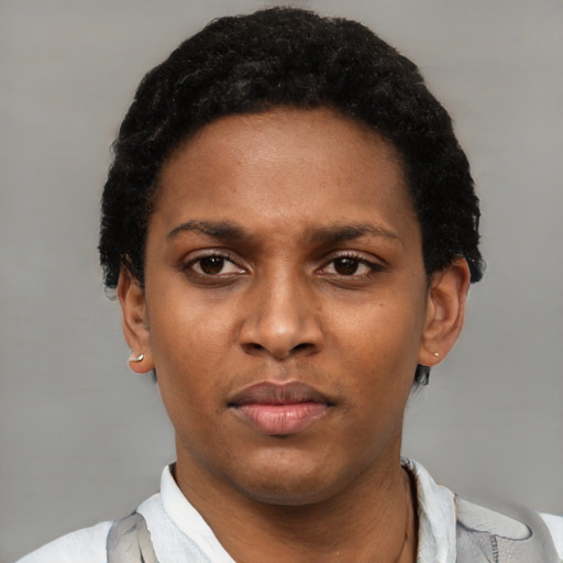 Neutral black young-adult female with short  black hair and brown eyes