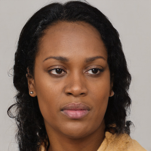 Neutral black young-adult female with medium  black hair and brown eyes